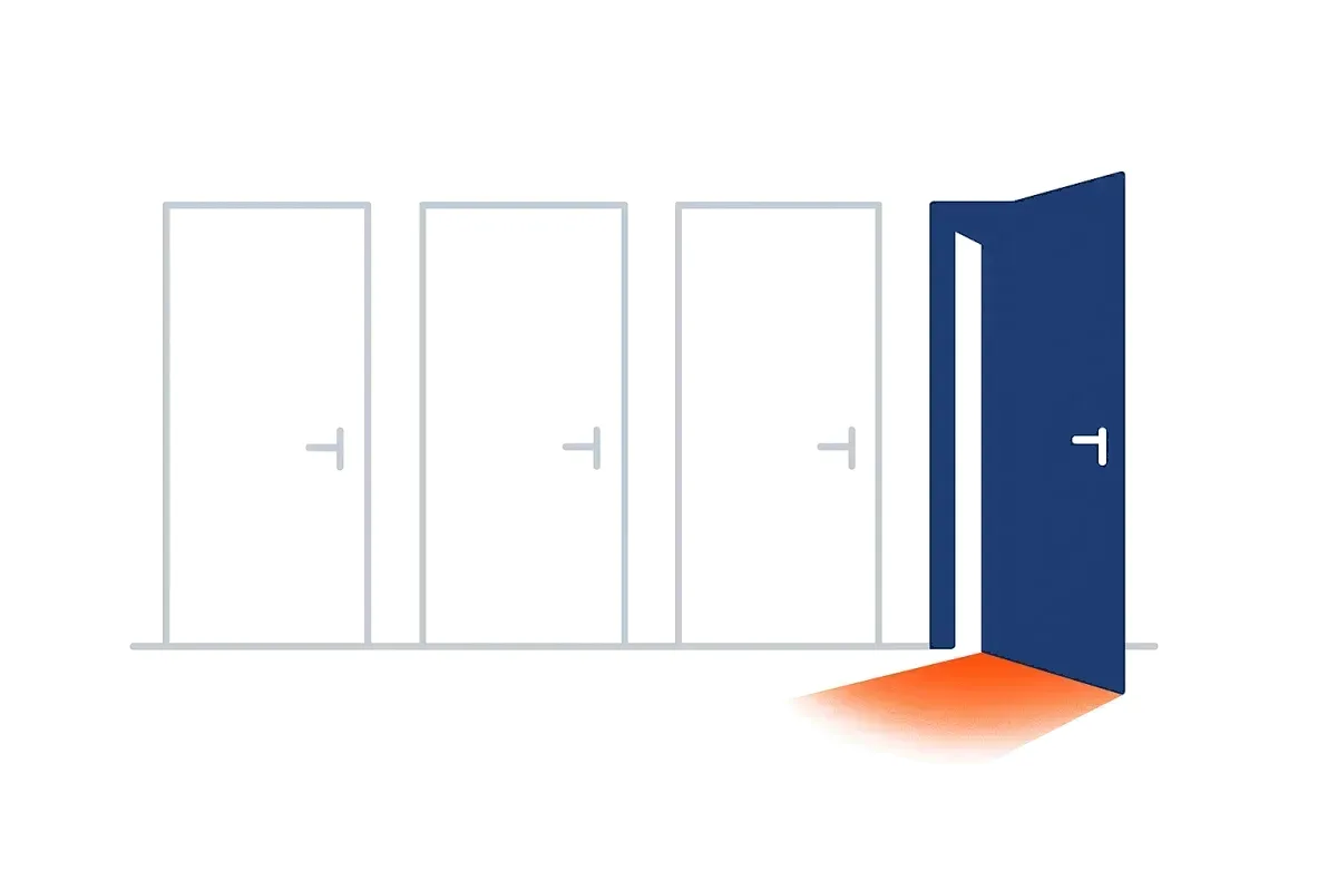 Three closed grey doorways beside one open navy doorway with orange light coming through