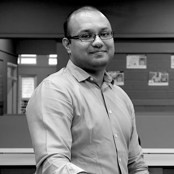 Anoop Kurup, marketing strategist and consultant, professional headshot in black and white